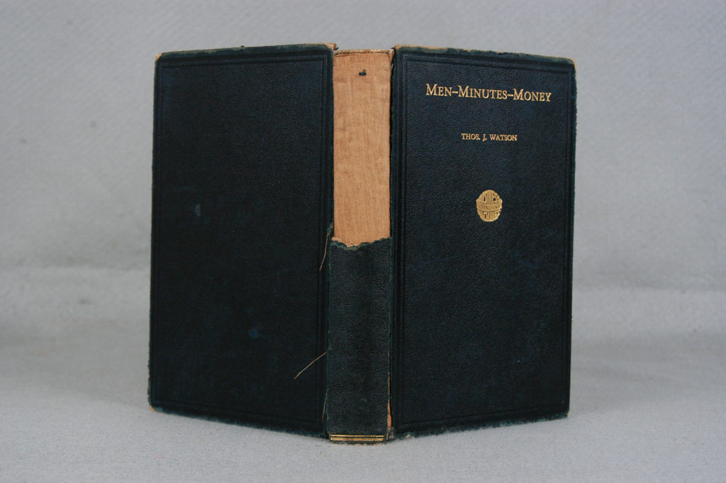 A book with the cover open and the title of " miss-minstrels-money ".