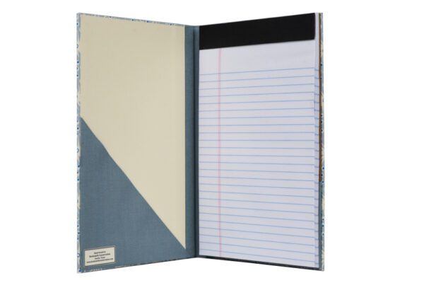 A notebook with a notepad inside of it.