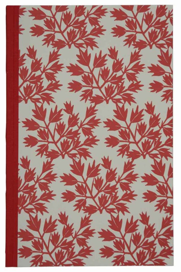 A red and white book cover with leaves