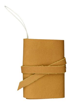 A brown book with a white string around the end.