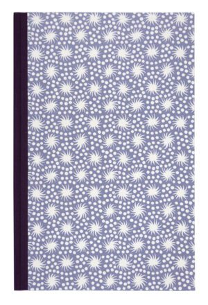 A purple cover with white flowers on it.