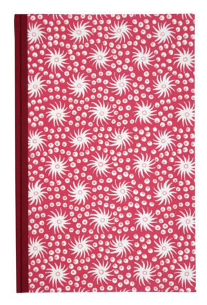 A red and white pattern is on the cover of a book.