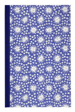 A blue book with white flowers on it.