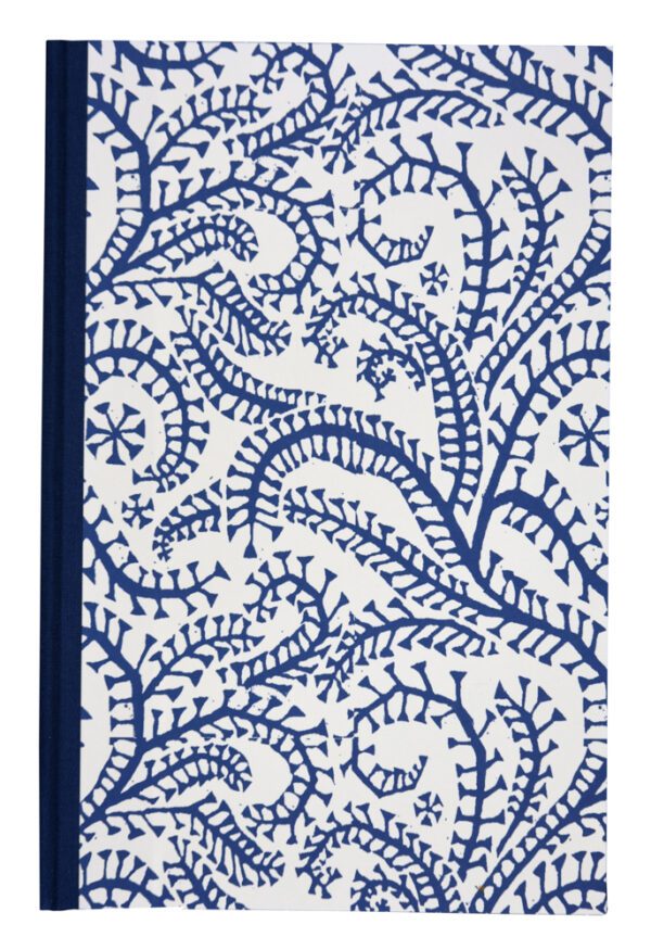 A blue and white cover with a pattern of leaves.