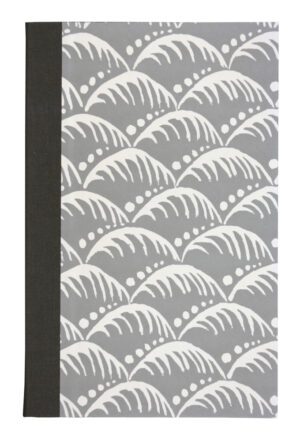 A notebook with a pattern of waves on it.