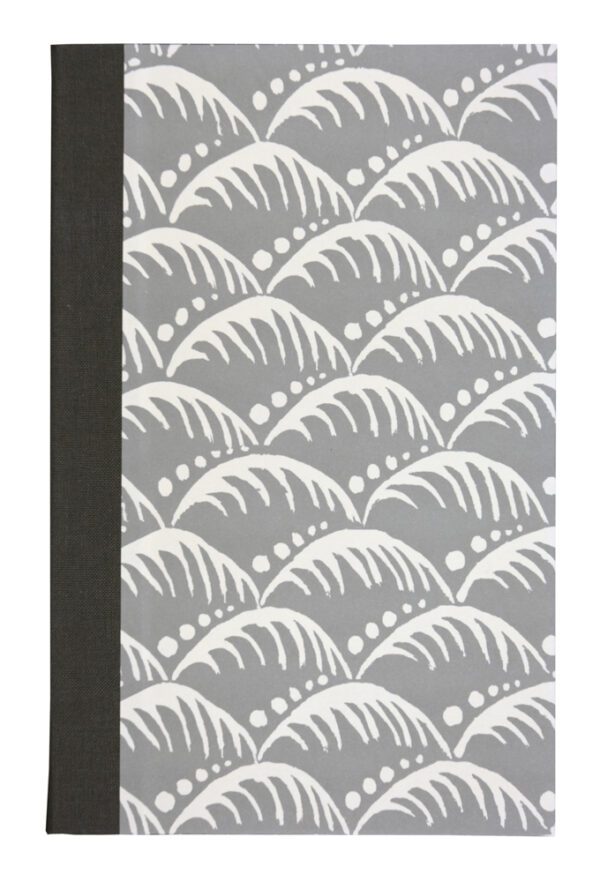 A notebook with a pattern of waves on it.