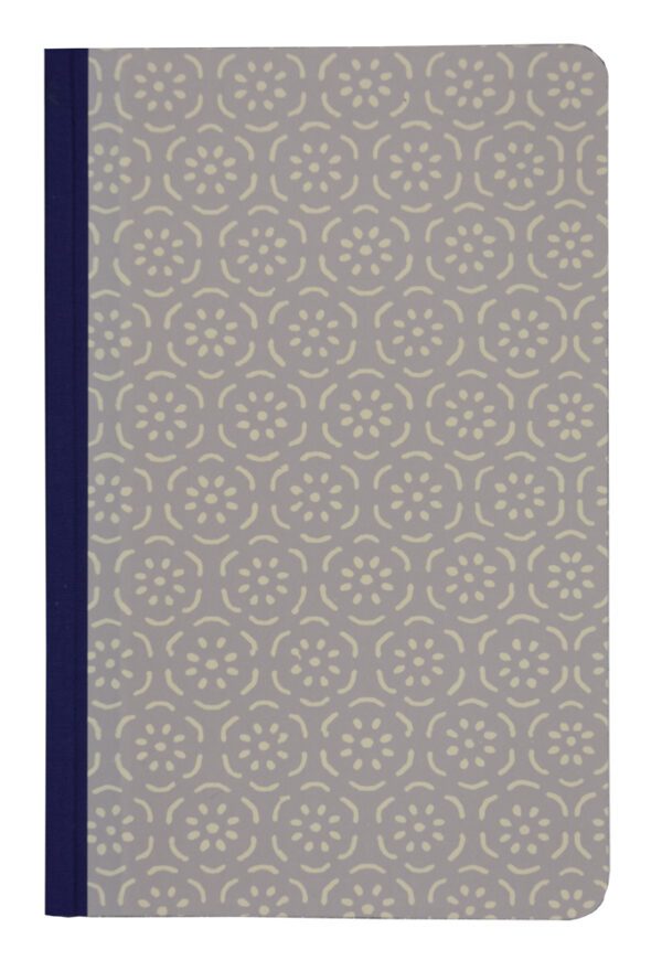 A notebook with a pattern on it.