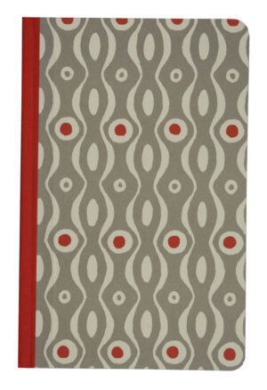 A notebook with an abstract pattern on it.