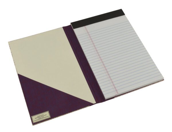 A notebook with a purple cover and lined paper.