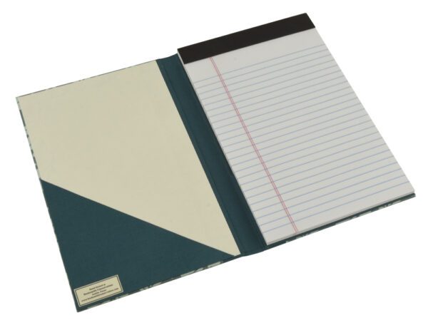 A notebook with a cover and lined paper.