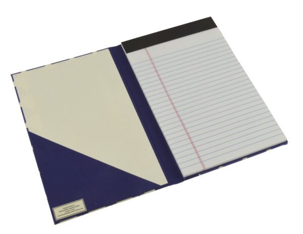 A notebook with lined paper and a blue cover.