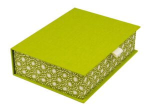 Lime green box with white floral pattern.