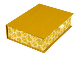 Mustard yellow box with geometric pattern.