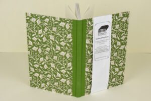 Green floral hardcover notebook.