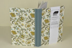 Floral-patterned hardback notebook.