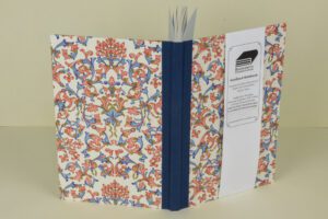 Floral-patterned hardcover notebook.
