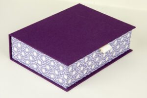 Purple box with white starburst pattern.