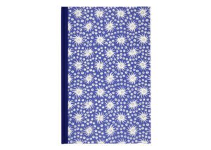 Blue notebook with white floral pattern.