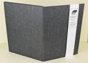 Gray refillable notepad holder, 8x12 inches.
