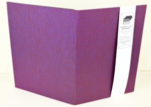 Purple refillable notepad holder.