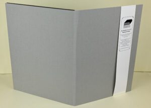 Gray refillable notepad holder.