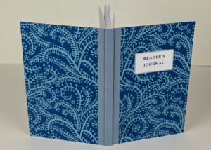 Reader's journal with blue paisley cover.