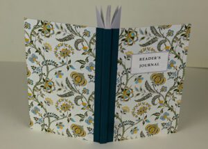 Floral reader's journal, teal spine.