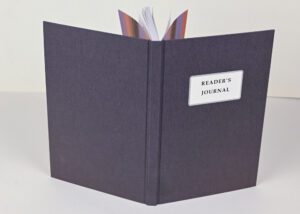 Reader's journal, dark purple cover.