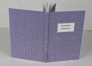 Purple reader's journal, closed.