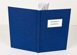 Dark blue reader's journal, closed.